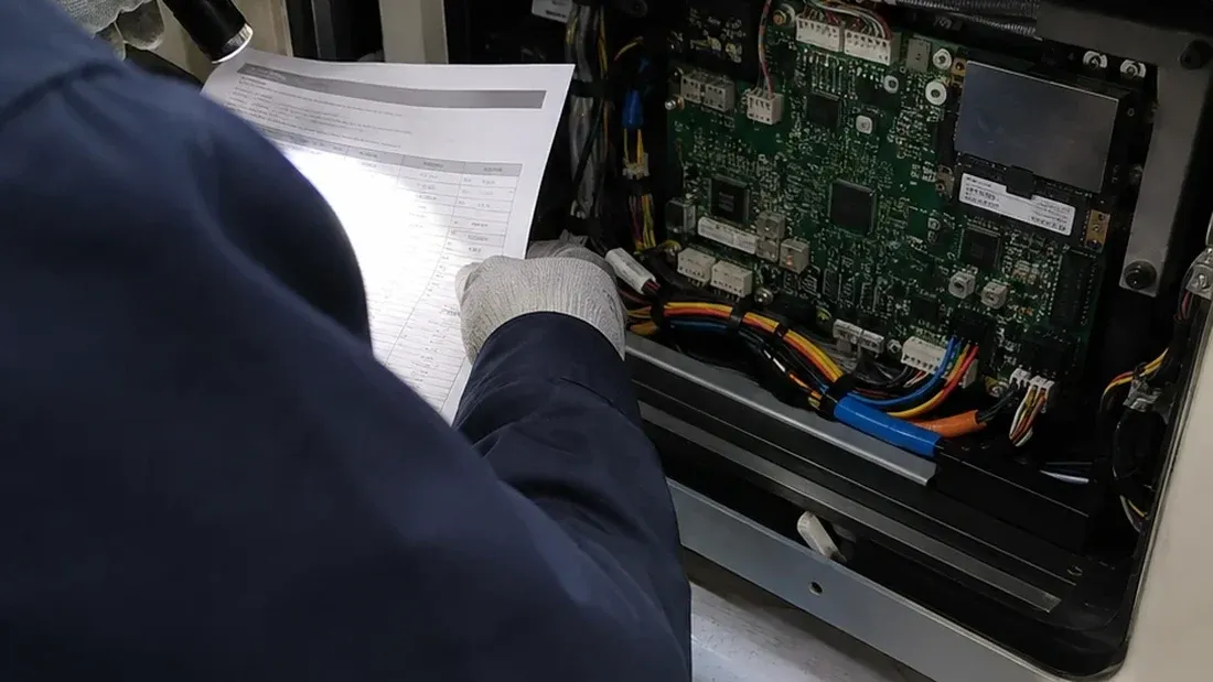 AI-generated illustration of a technician reviewing a checklist beside an open industrial control cabinet