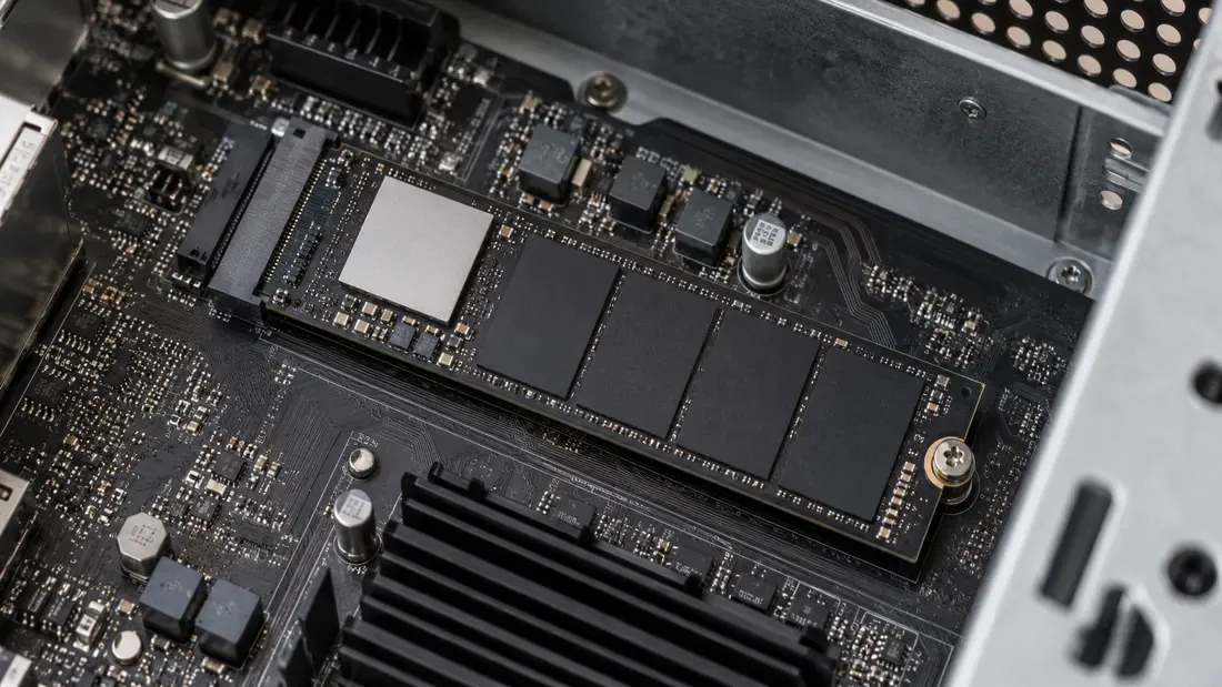 M.2 NVMe drive fully installed and screwed into a host board